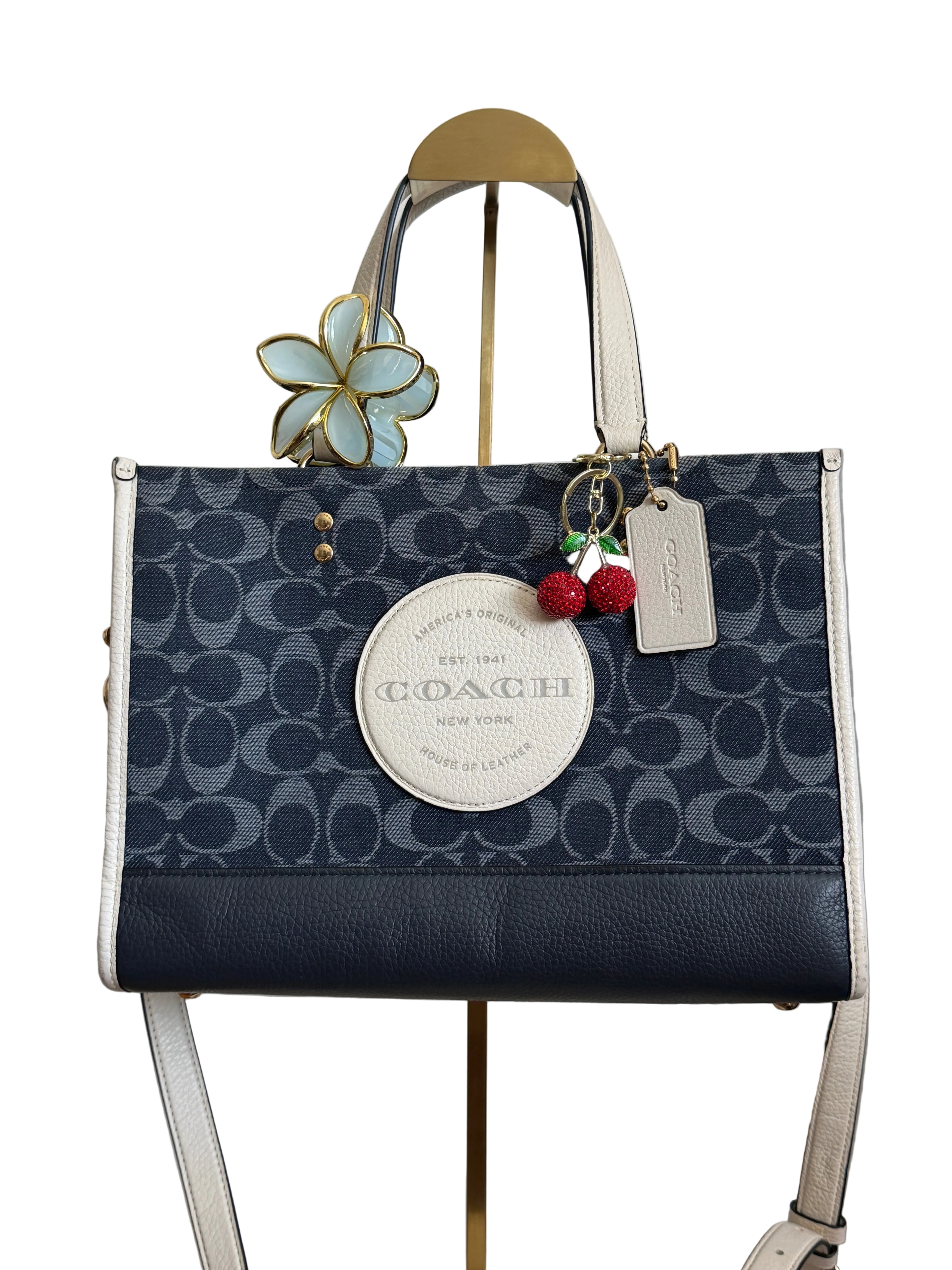 Coach Dempsey carryall in blue denim
