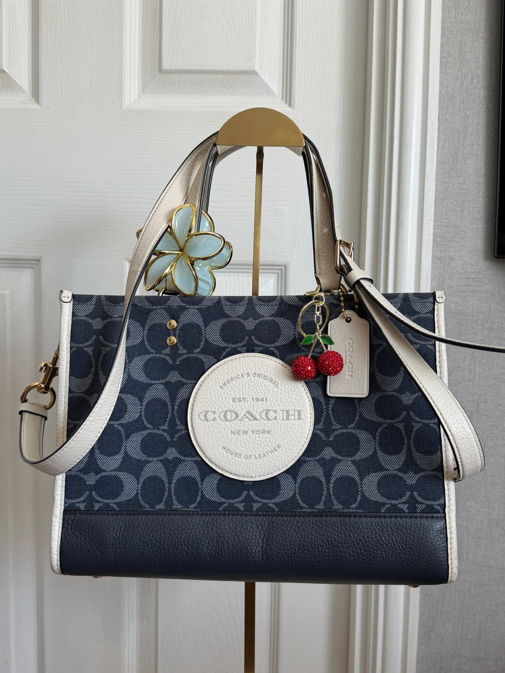 Coach Dempsey carryall in blue denim