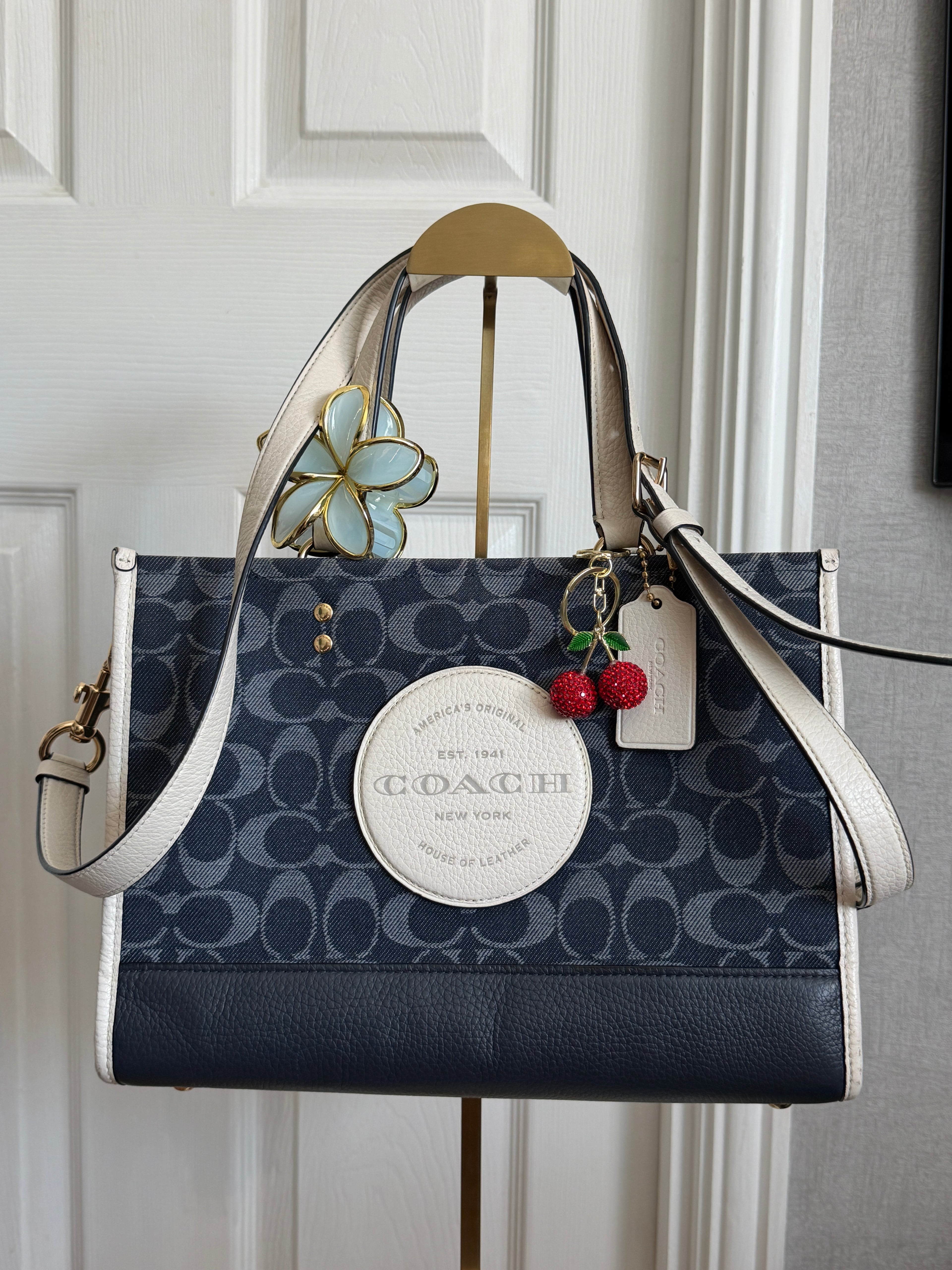 Coach Dempsey carryall in blue denim
