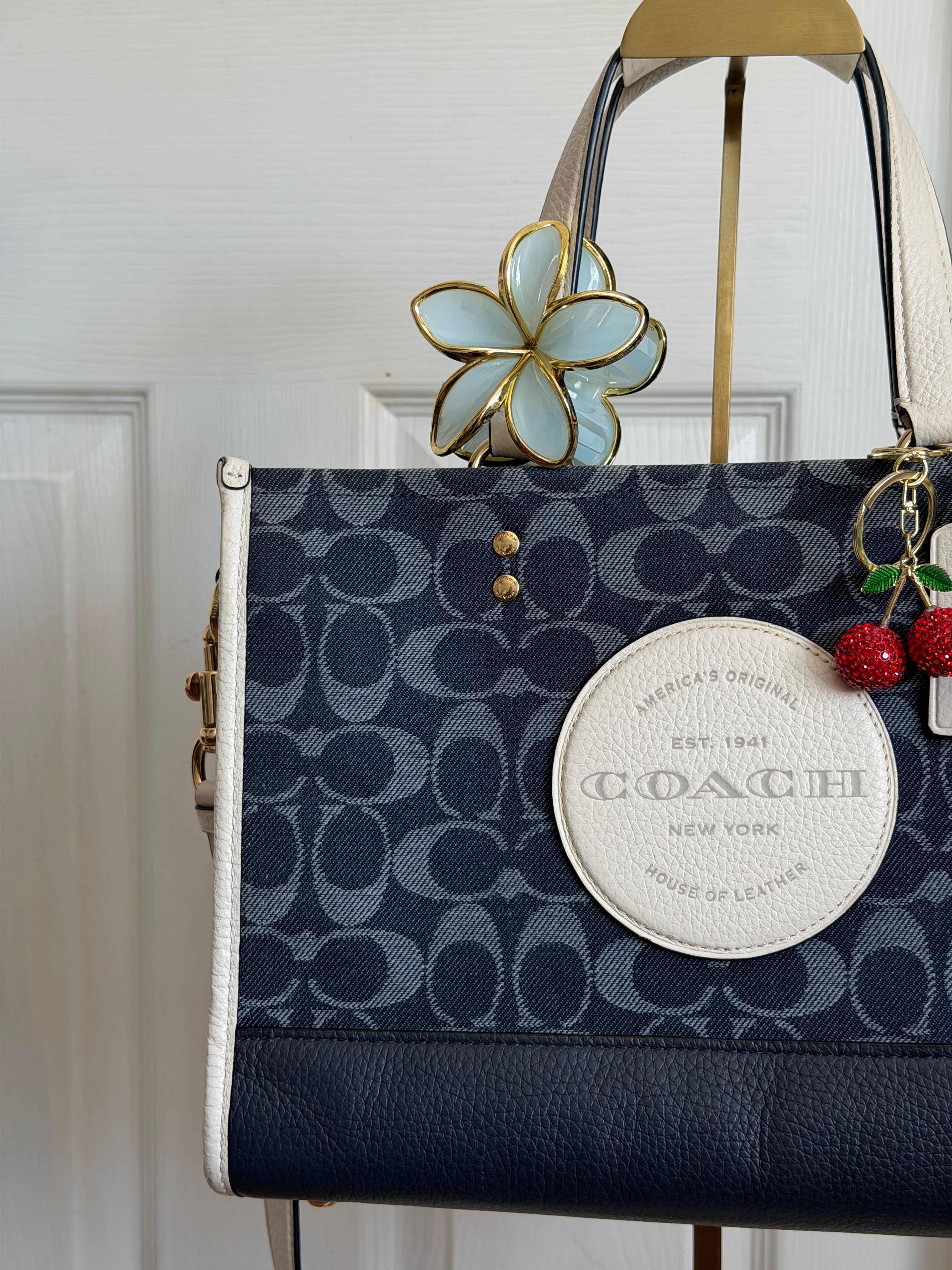 Coach Dempsey carryall in blue denim