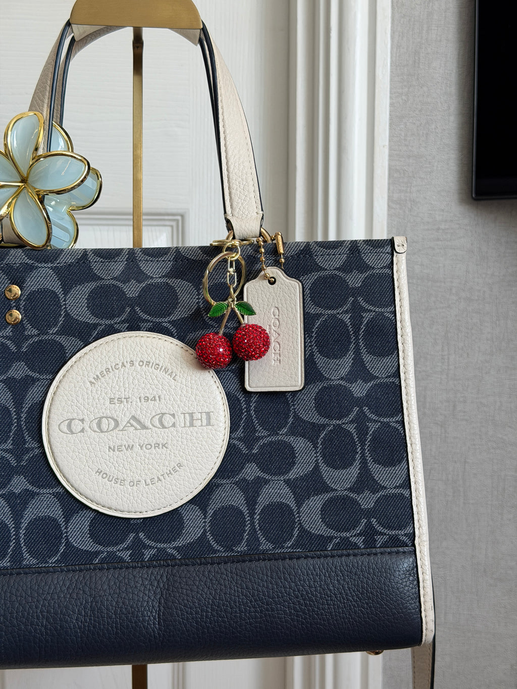Coach Dempsey carryall in blue denim