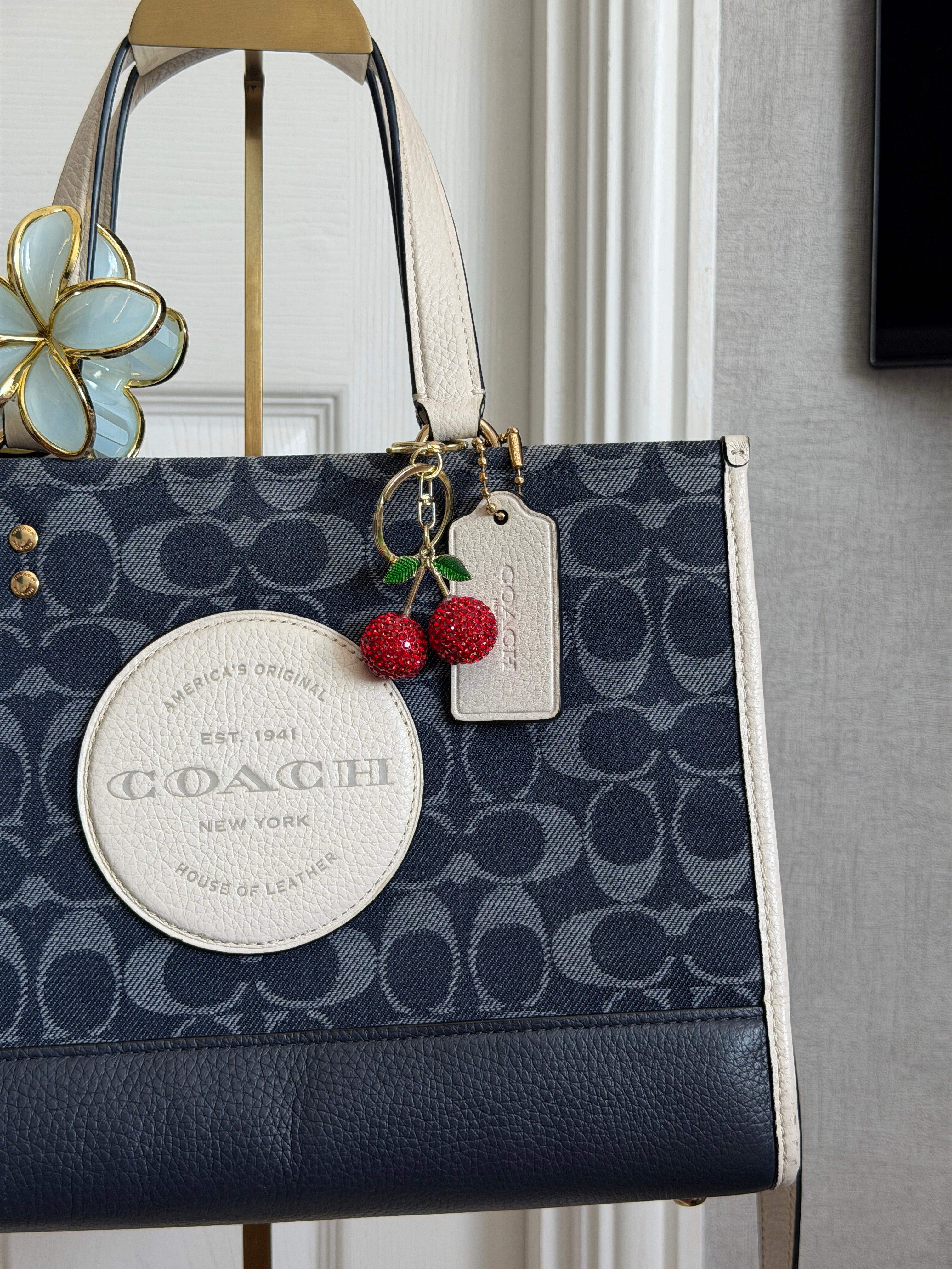 Coach Dempsey carryall in blue denim