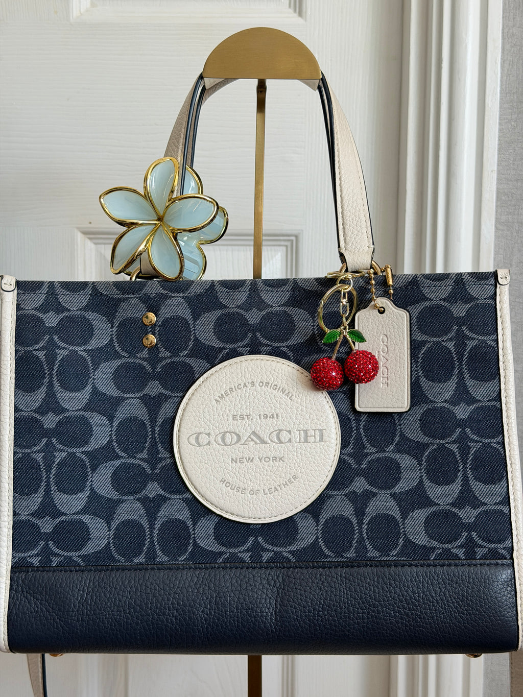 Coach Dempsey carryall in blue denim