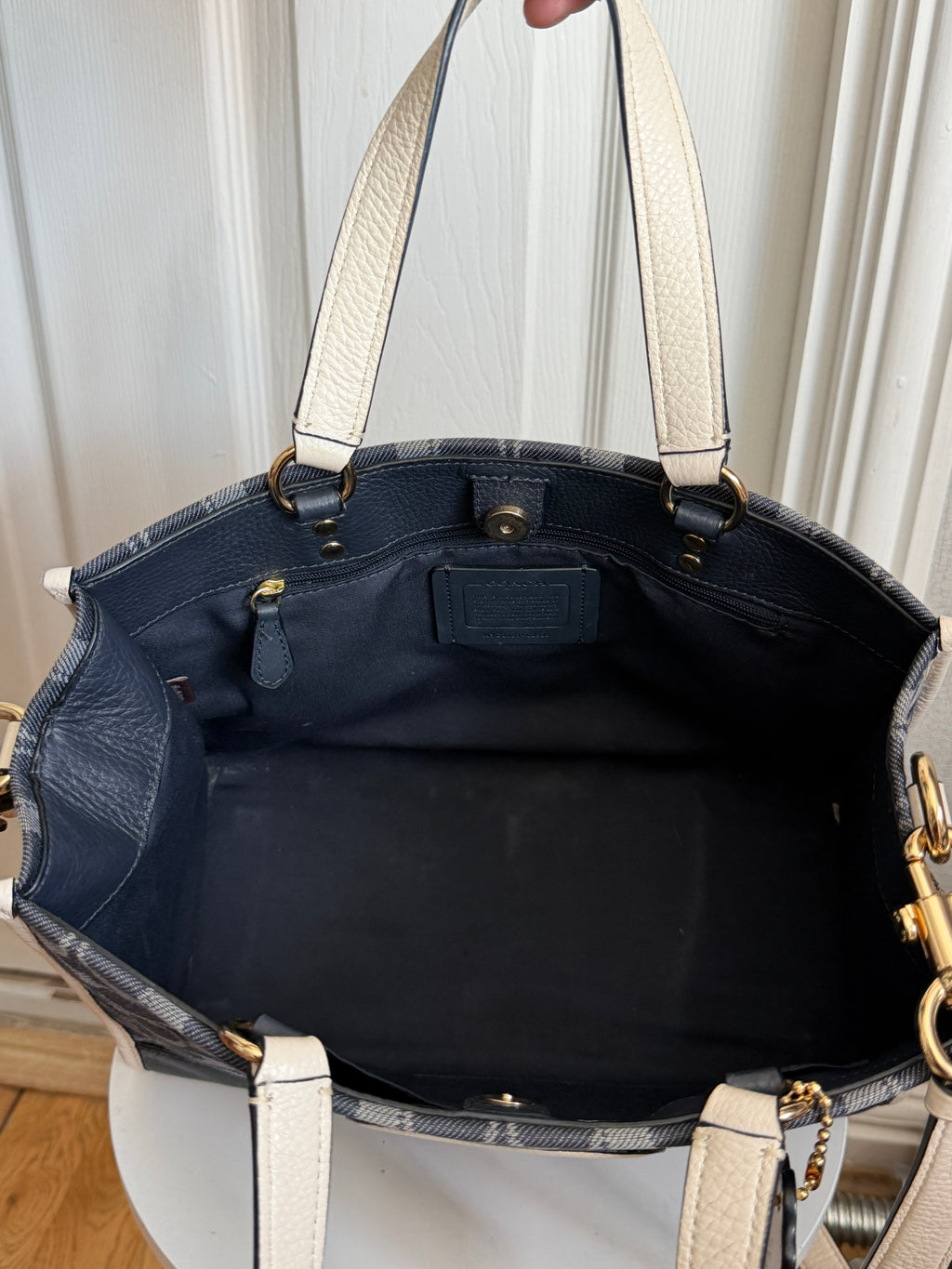 Coach Dempsey carryall in blue denim