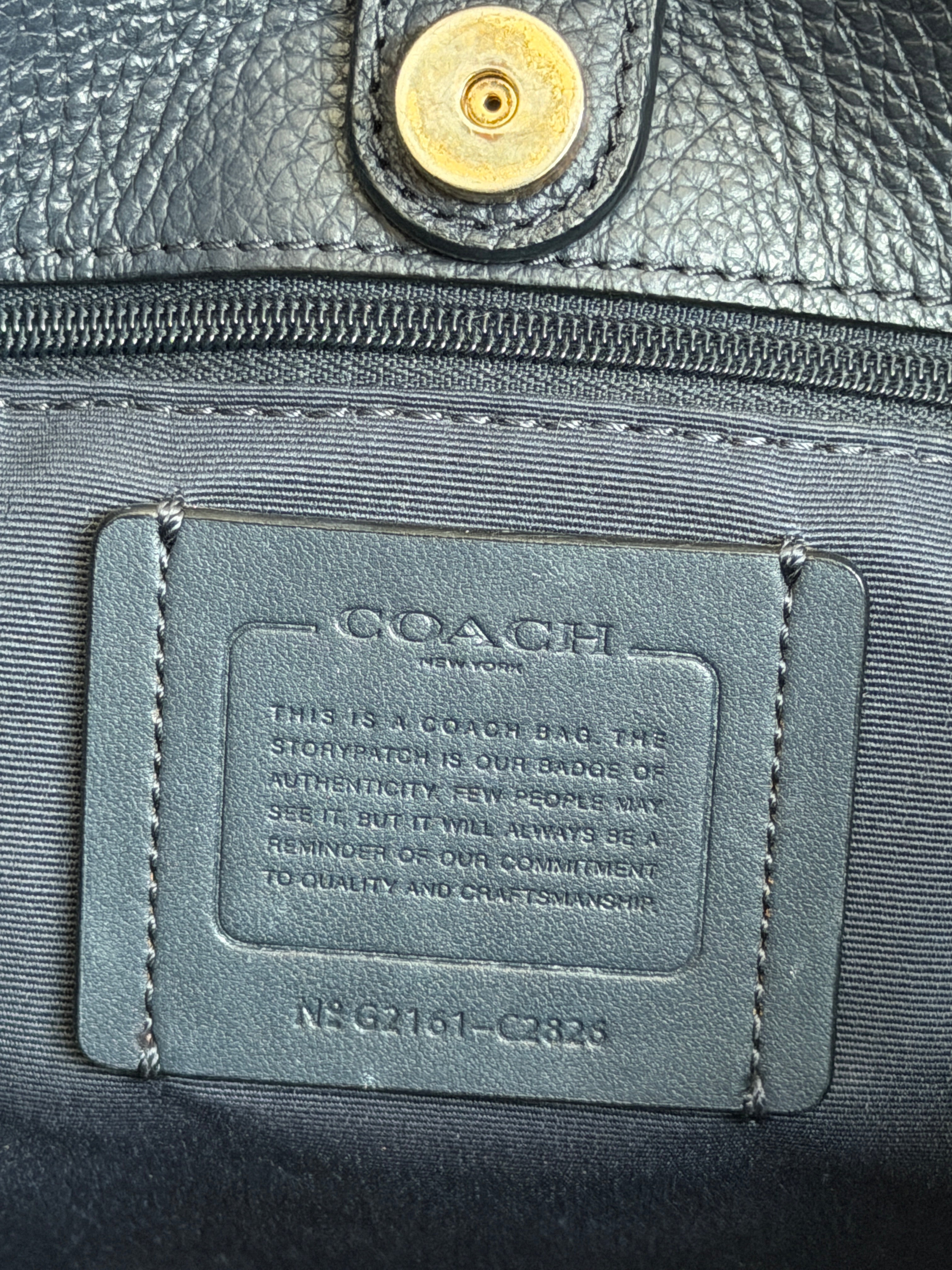 Coach Dempsey carryall in blue denim